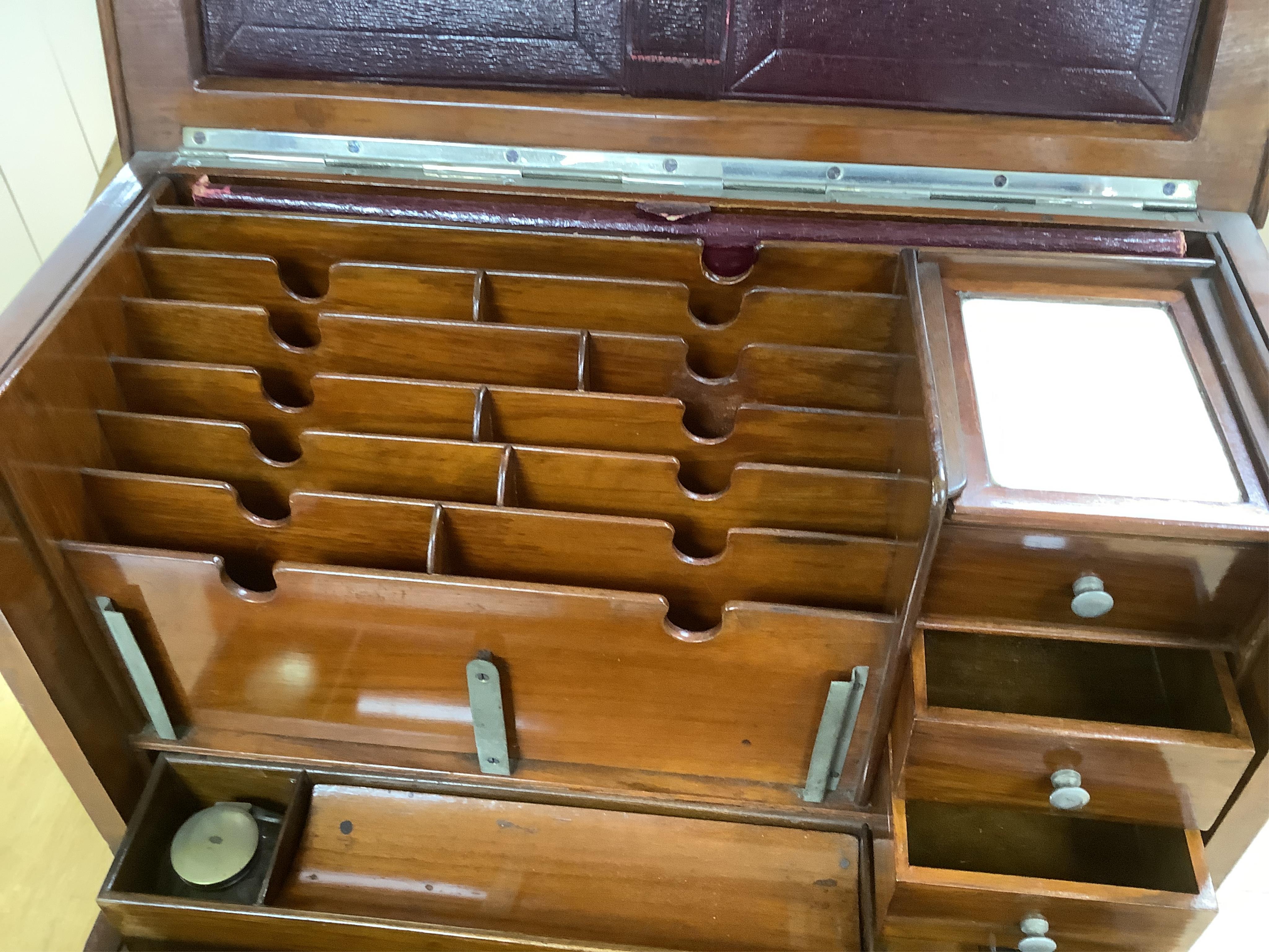 A Victorian burr walnut travelling stationery compendium combined with writing slope, 43cm wide. Condition - fair